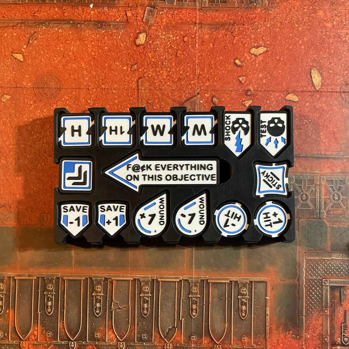 ttr-327-case-loaded: travel case loaded with the full Blue token set, seen from above
