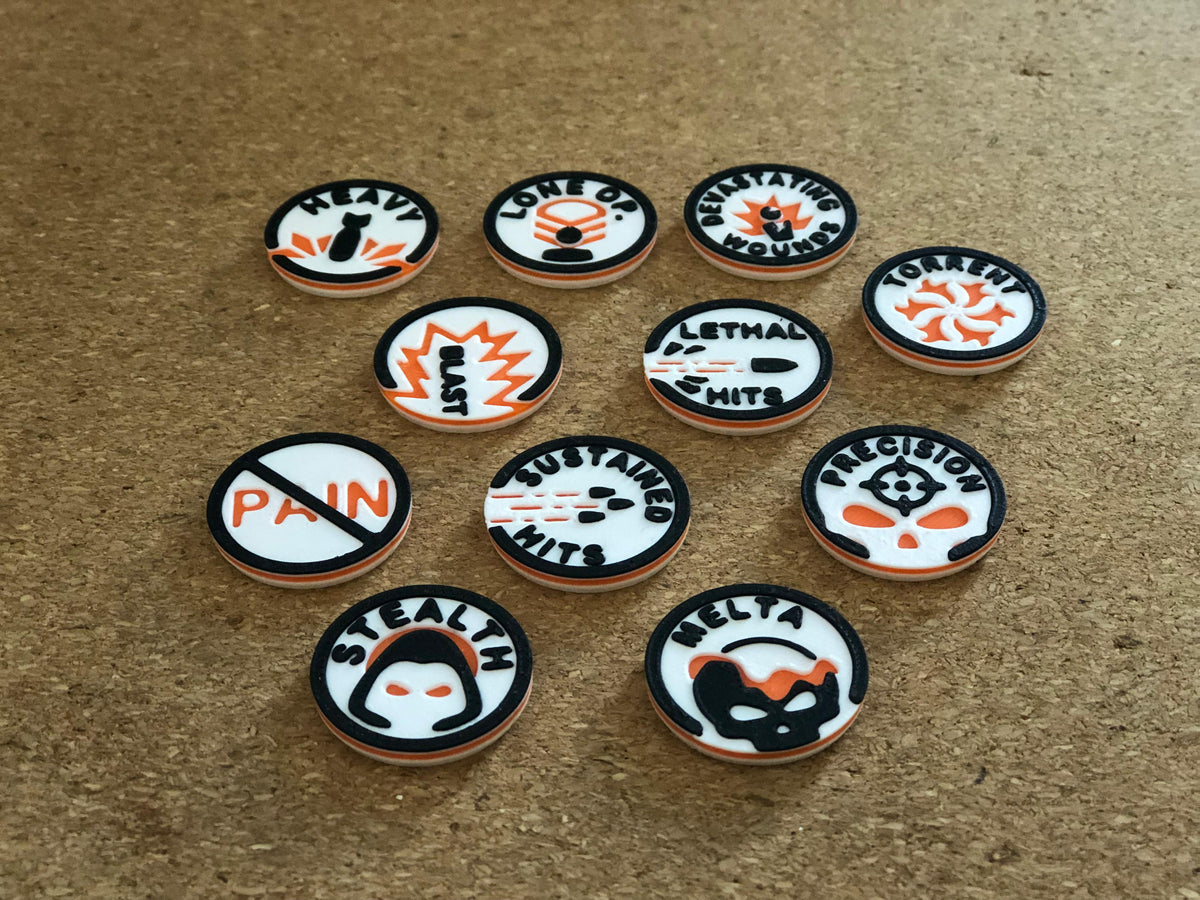 mw-329-layout — weapon ability tokens laid out: Heavy, Lone Operative, Devastating Wounds, Torrent, Lethal Hits, Precision, Sustained Hits, Stealth, Melta, Feel No Pain, Blast