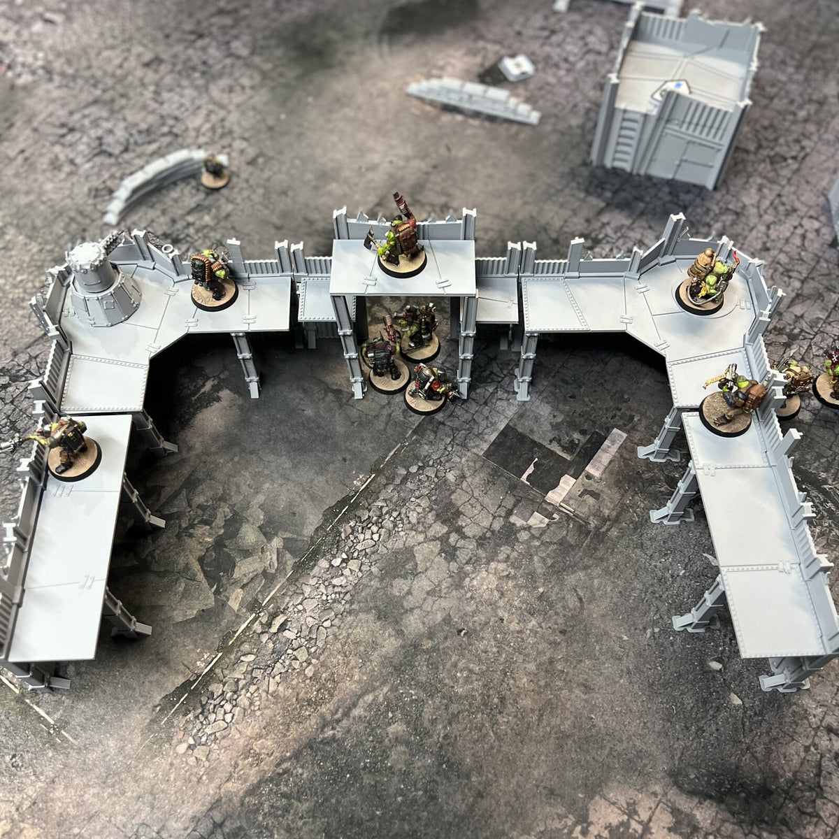 Overhead view of the Scrap Fort showing the linked parapet walkways and access ramps