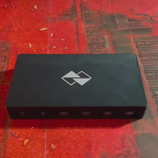ttr-327-video-case: the travel case lid slides off to reveal the loaded token tray