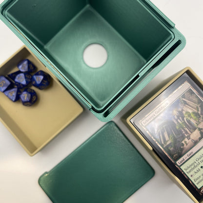 Inside the Lockable Commander deck box, showing the push port in the base