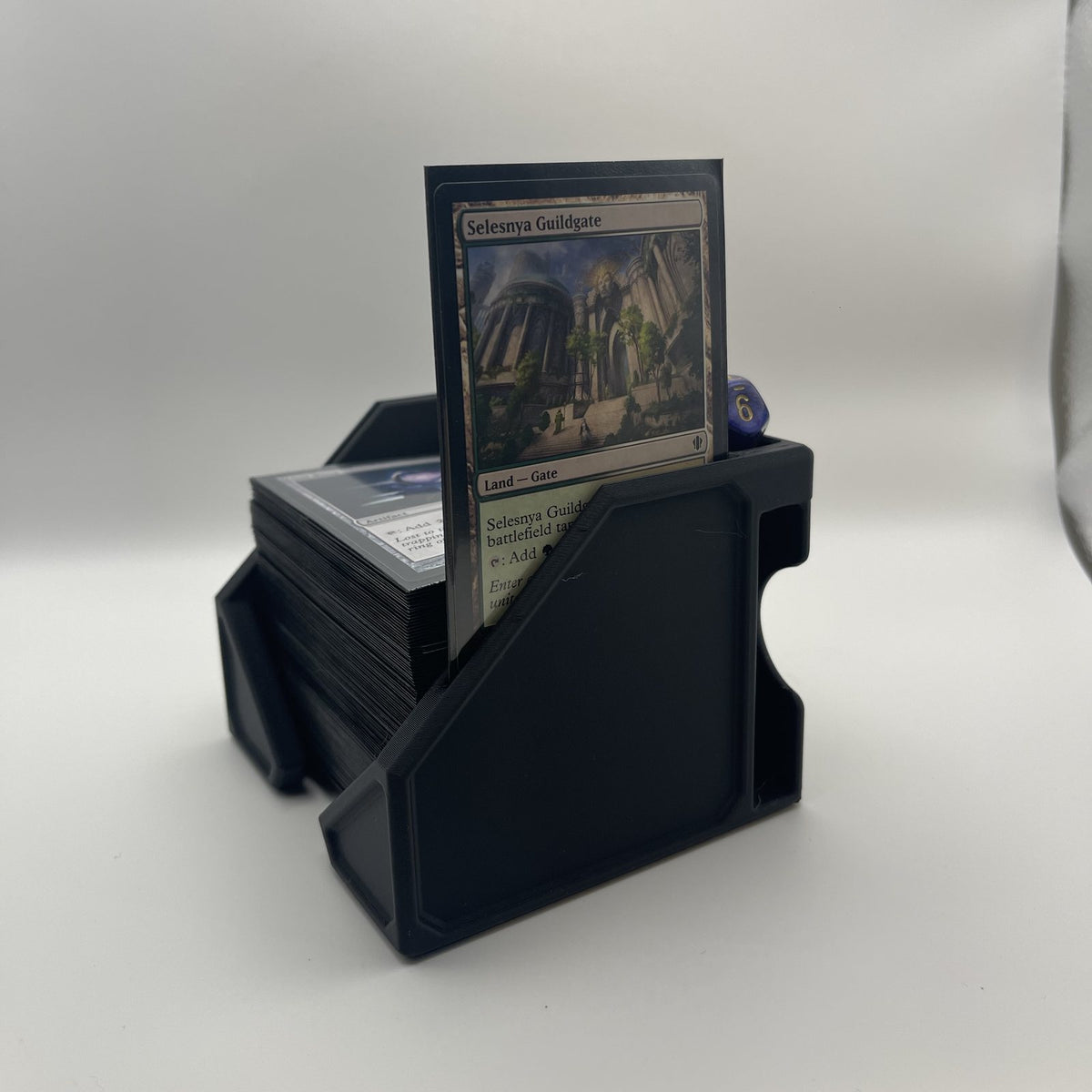 Commander deck organiser from the side, showing the inclined deck bay